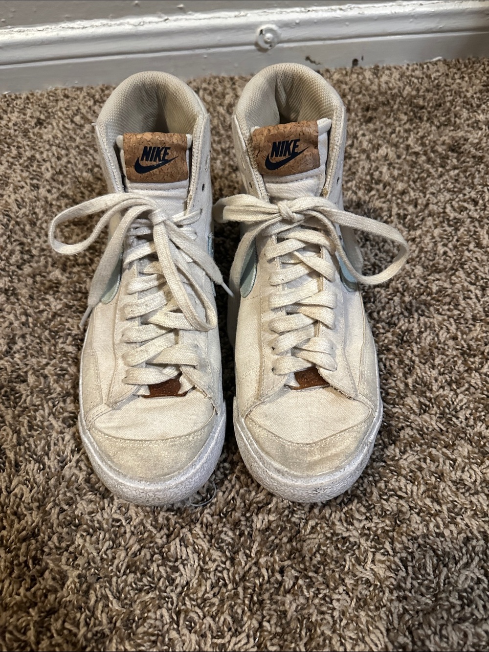 Well Loved Nike Off-White High-Top Sneakers with Brown Accents